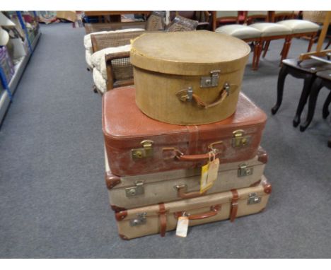 Three 20th century luggage cases together with a further vintage hat box  