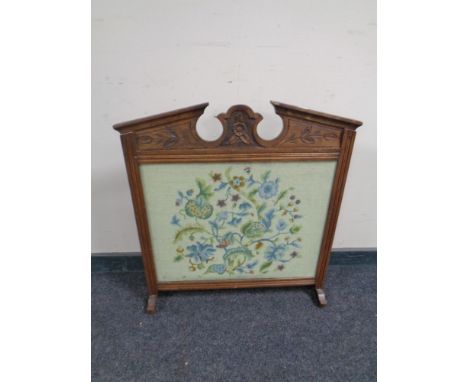An Edwardian tapestry fire screen  