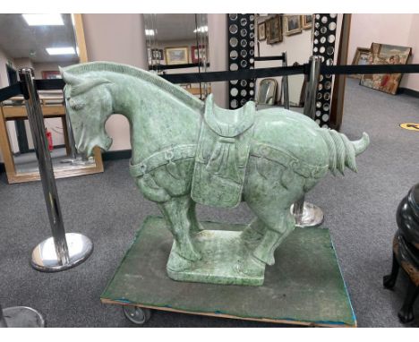 An impressive large Chinese jade figure carved in the form of a Tang horse, height 88 cm.