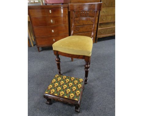 An antique beech wood dining chair together with a tapestry upholstered footstool on paw feet 