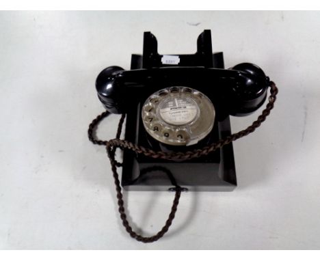 A vintage black Bakelite telephone 