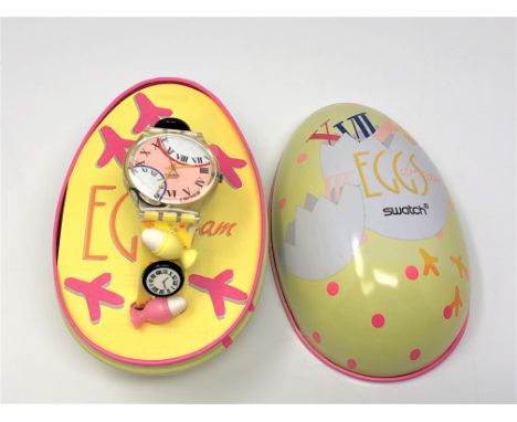 A Swatch Eggs Dream watch in box. 