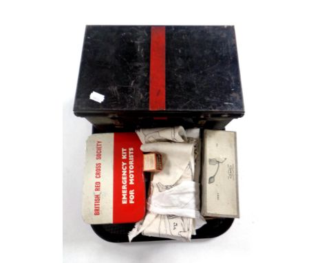 A tray containing a quantity of vintage medical supplies to include British Red Cross tin, Teaching Aid bandages etc   