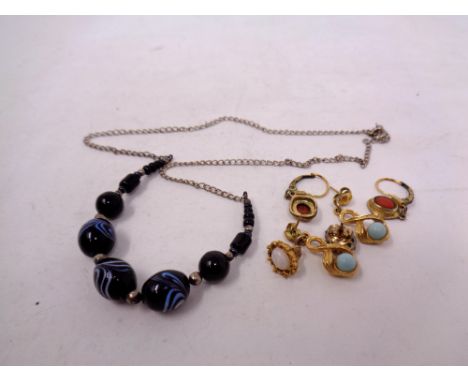 A vintage necklace together with a quantity of earrings