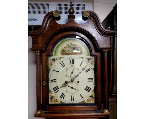 A 19th century oak cased longcase clock with painted dial, pendulum and weights  