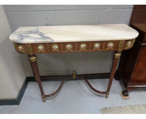 A French style marble topped console table with brass mounts  