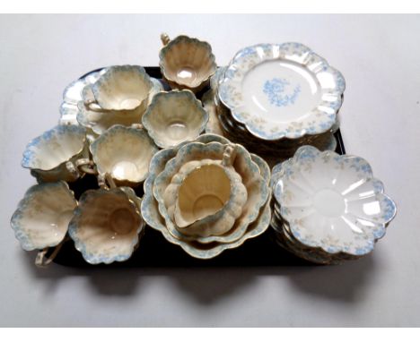 A tray containing a 40 piece 19th century Foley china tea service 