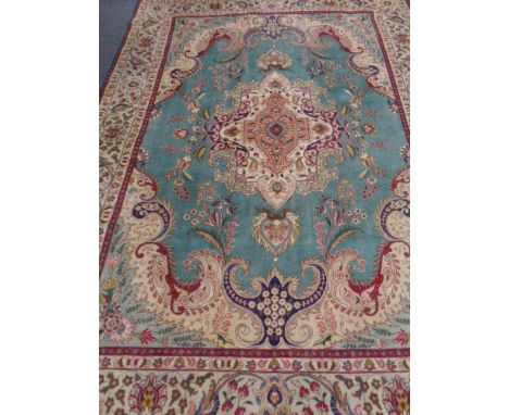 A Kirman carpet, South East Iran, 337cm by 257cm. 