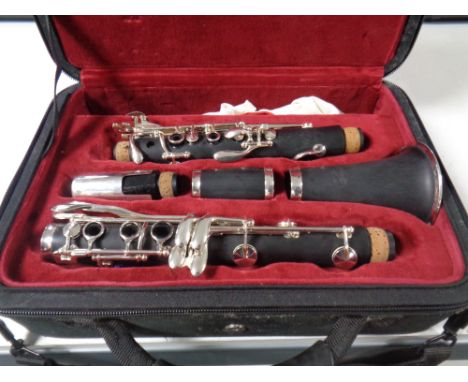 A five piece clarinet in fitted case  