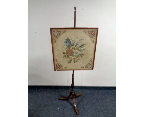 A Victorian tapestry pole screen  
