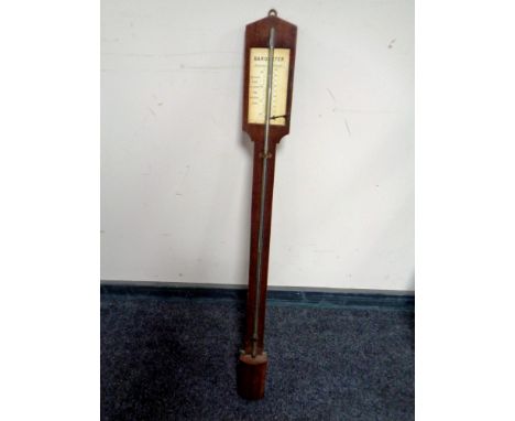 An antique stick barometer  