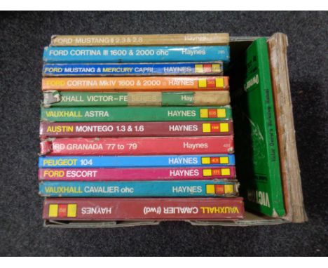 A box containing a quantity of vintage Haynes car manuals   