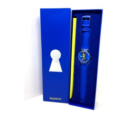 A Swatch Open It watch in box. 