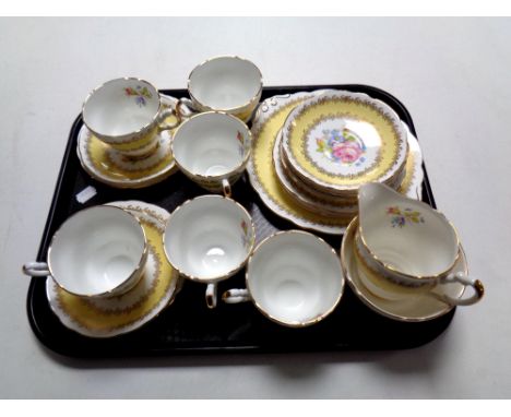 A tray containing a 21 piece Majestic bone china tea service  