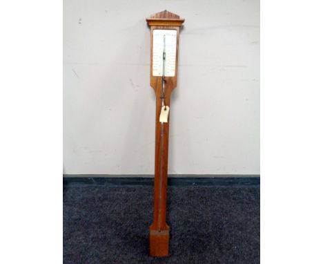 An antique stick barometer 