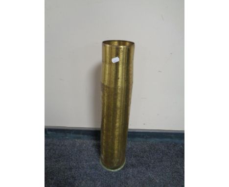 A brass ammunition shell casing, height 62 cm  