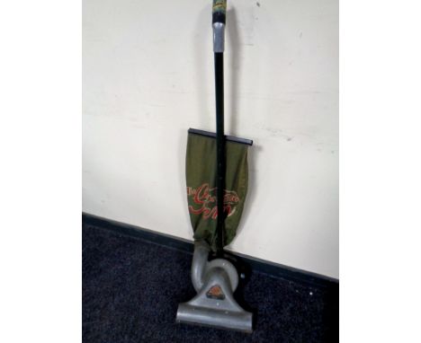 A vintage Gem upright vacuum  