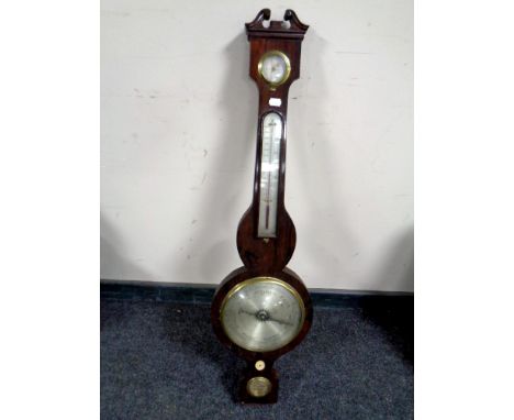 An antique banjo barometer by R Neale Hunton with silvered dial   