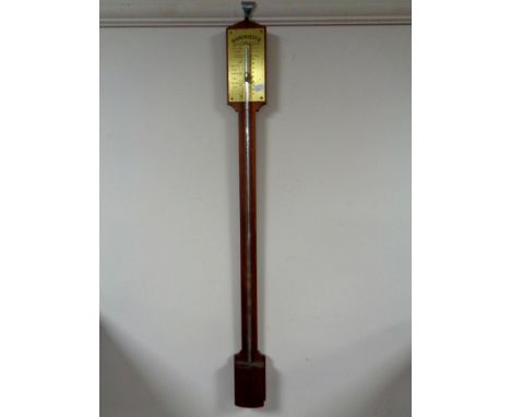 An antique stick barometer  