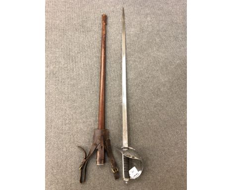 A George V 1897 pattern infantry officer's sword by P Groves of 53 Wellington Street, in leather scabbard with frog. 