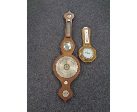 An Edwardian banjo barometer together with a further oak barometer (as found)   