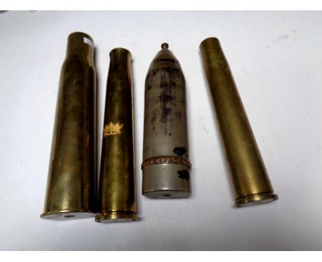 Four brass ammunition shells 