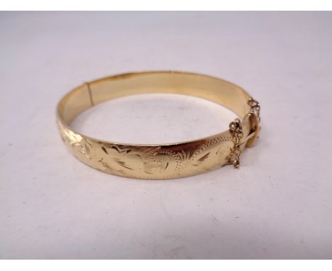 A 9ct gold plated on silver bangle 