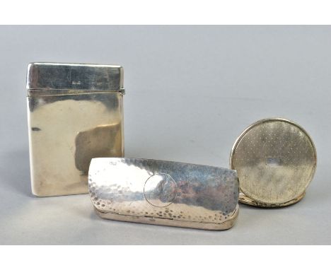 A GEORGE V SILVER SPECTACLES CASE, hand hammered finish, engraved initials to circular cartouche, Chester 1915, together with