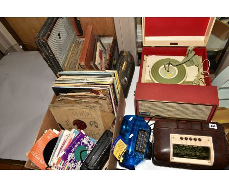 A BUSH BROWN BAKELITE RADIO, Type DAC 10, a red and cream Dansette Conquest Auto record player, a Freeplay self powered radio