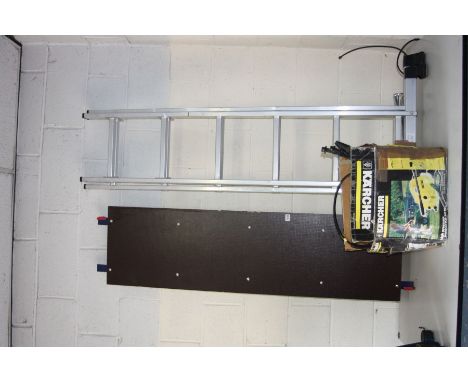 AN ALUMIUM EXTENSION LADDER, length 170cm with 85cm footed ends and a 160cm long platform tread and a Karcher jet washer (PAT