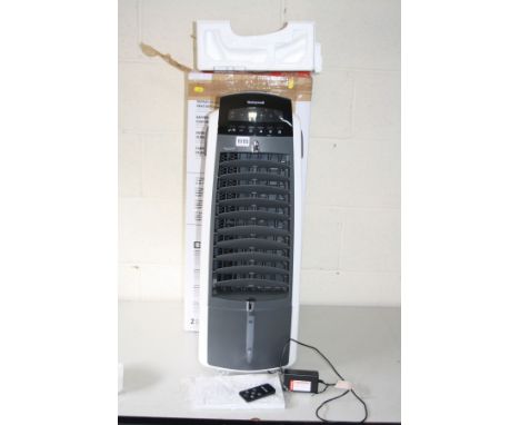 A HONEYWELL ES800 DEHUMIDIFIER with original box, remote and manual (PAT fail due to European plug)