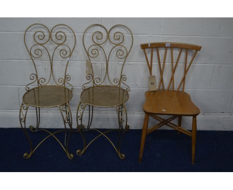 AN ERCOL BLONDE ELM CROSS SPINDLE BACK CHAIR, together with a pair of metal wire chairs (3)