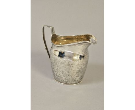 A GEORGE III SILVER HELMET SHAPED CREAM JUG, bright cut decoration, maker's mark partially rubbed, London 1800, approximate w