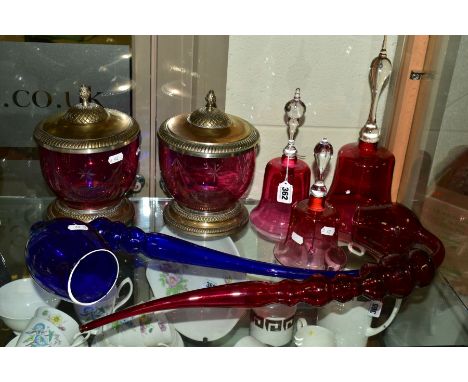 A GROUP OF GLASSWARE comprising of a large Bristol blue glass pipe, length 57cm (cracks along rim) together with three simila