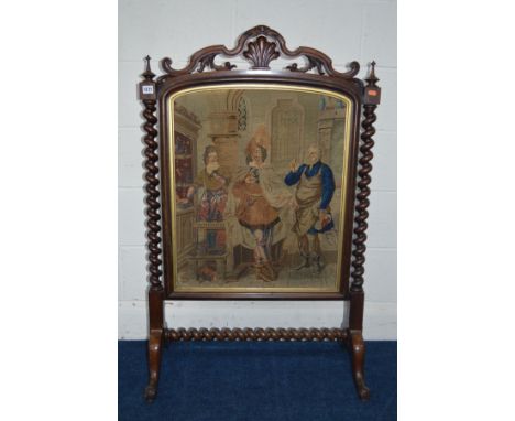 A VICTORIAN ROSEWOOD TAPESTRY FIRESCREEN, the top rail with foliate and scroll detail, twin barley twist rails flanking a nee