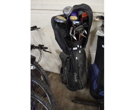 Golf caddy and a quantity of clubs