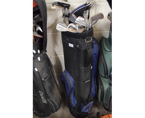 Golf caddy and a quantity of clubs
