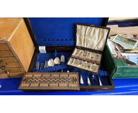 A canteen and quantity of matched cutlery, cake forks and a cribbage board