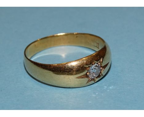 A Victorian gold gipsy ring, set old brilliant cut diamond of approx 0.2cts, (teats as 18ct gold approx), P 1/2, 4.4g. 