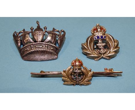 A 9ct Gold royal Navy sweetheart brooch, 3.6g, a silver and enamel RNR brooch and a silver Royal Navy coronet brooch, (3). 