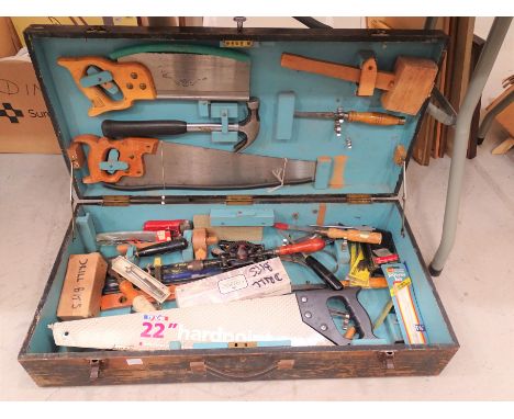 A wooden Stanley tool box, 78cm long, 16cm high, 40cm deep containing a selection of woodworking tools. 