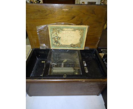 A Swiss inlaid rosewood musical box, comb lacking and in poor condition, 48cm wide, together with a Campbell Broad Reed Melod