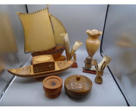 Treen items to include boat light with parchment sails, boat jewellery box, olive wood vase etc