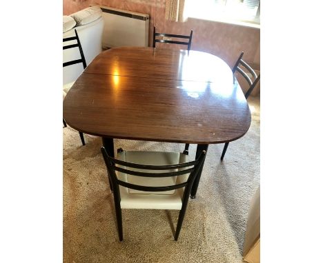 Retro E Gomme G Plan extending dining table with one leaf and 4 ladder back chair frames table is 46 inches wide 54 closed 74