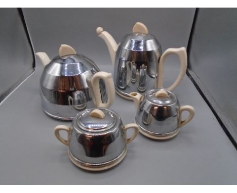 Ceramic and metal teapot set