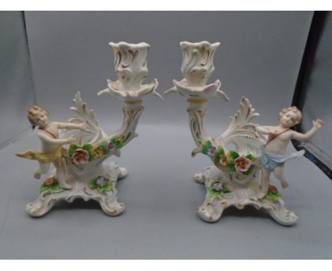 Pair vintage porcelain cherub candlestick holders