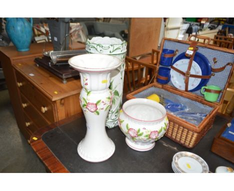 A jardiniere on stand; together with a floral decorated stick stand