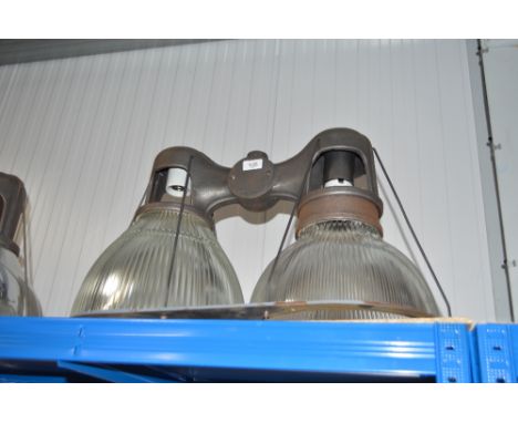 An industrial style double ceiling light with cast iron frame