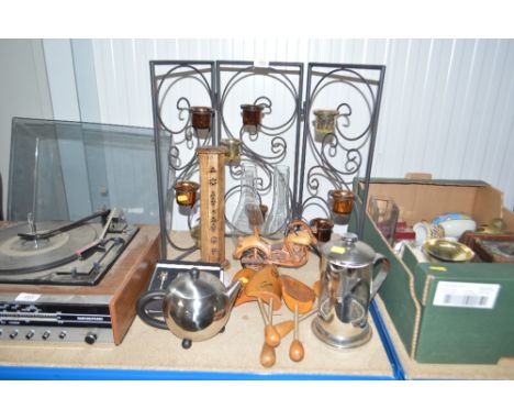 A quantity of metal ware to include a tea light holder; shoe stretcher; coffee strainer; wooden ornament in the form of a bik