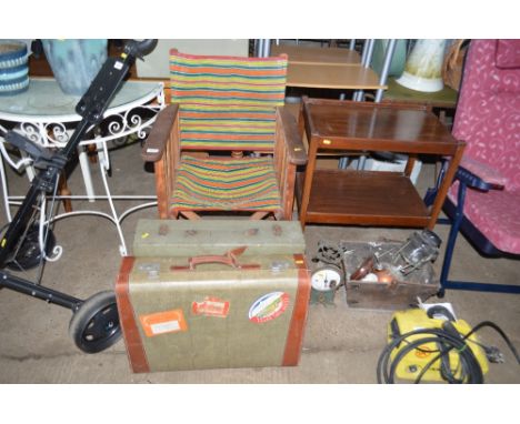 A folding chair; a two tier trolley; two suitcases; a box containing a leather tape measure; a Tilley lamp; and a set of scal